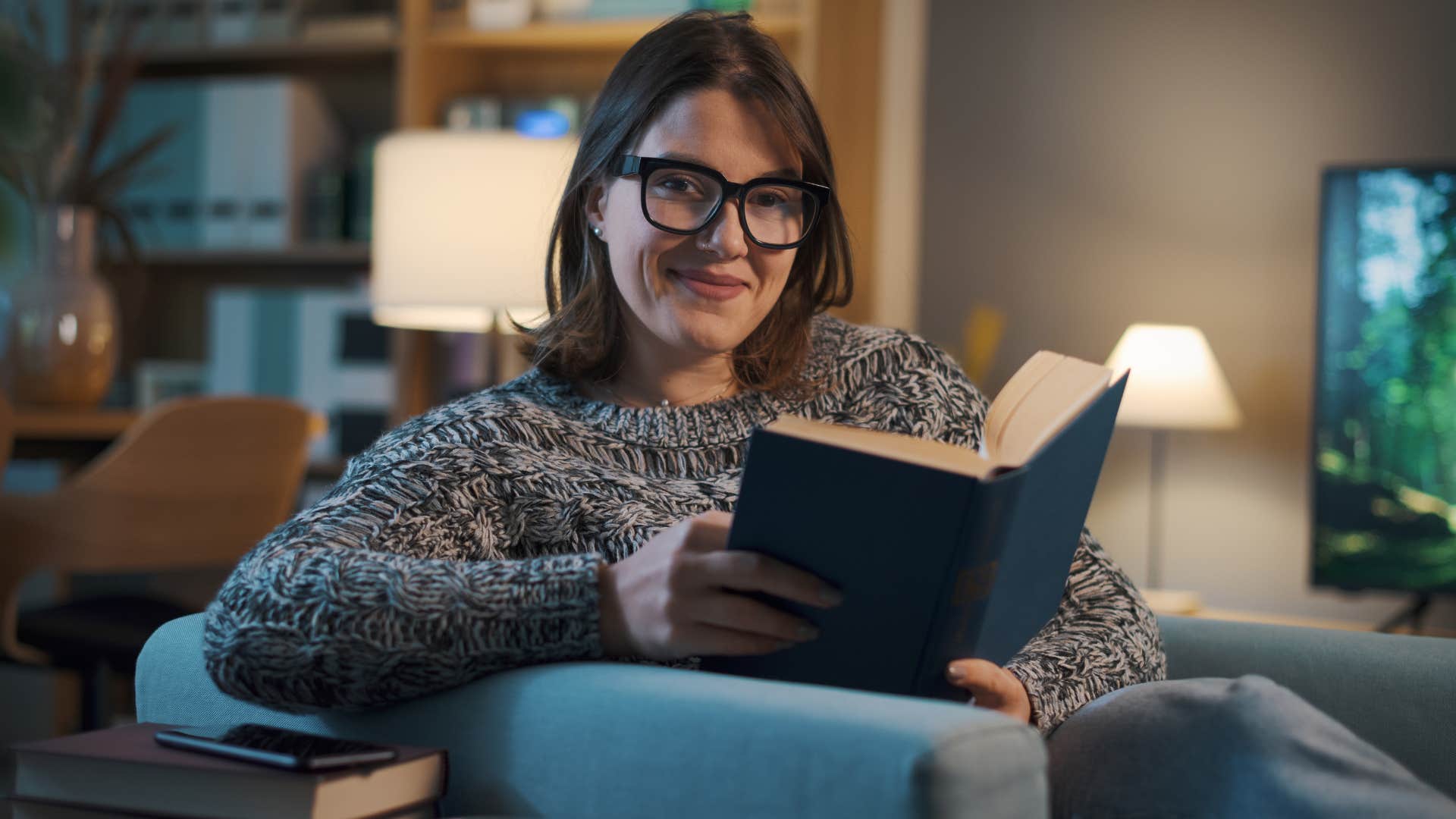 woman who prefers her own company reading at home