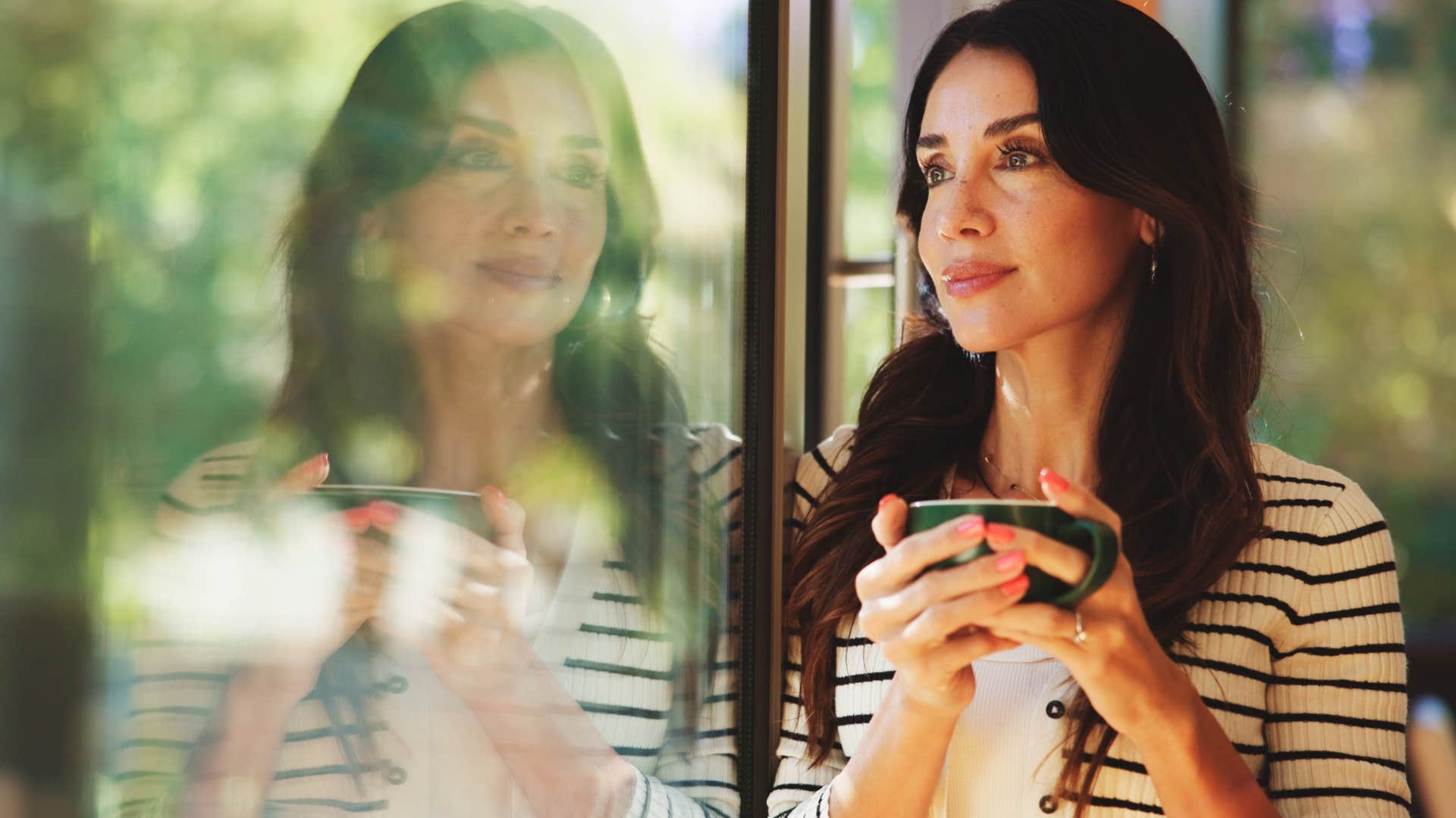 pensive woman who's protective of her energy