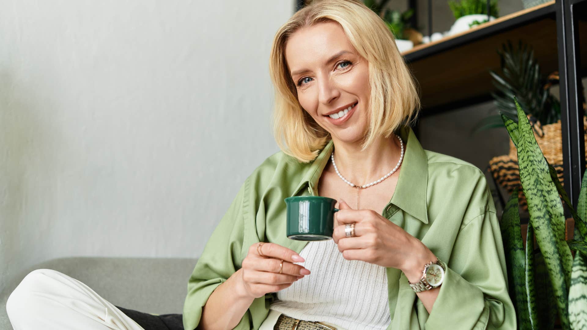 confident woman who trusts herself sitting at home