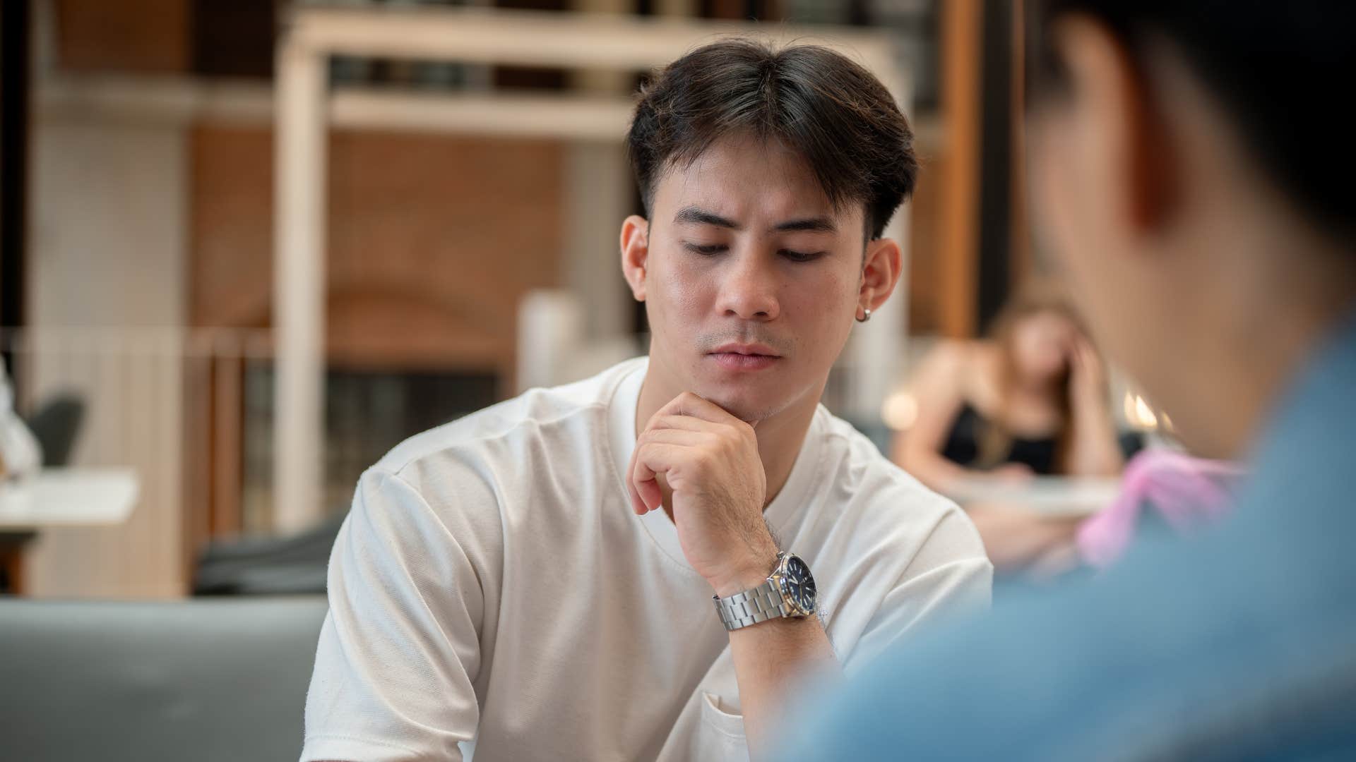 deep man saying let me think about that during casual conversation with friend