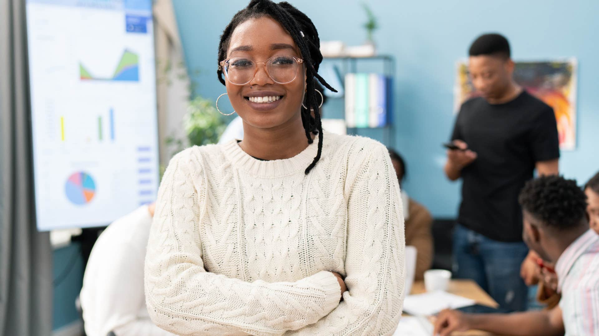 manipulative woman reading the energy of a room at work