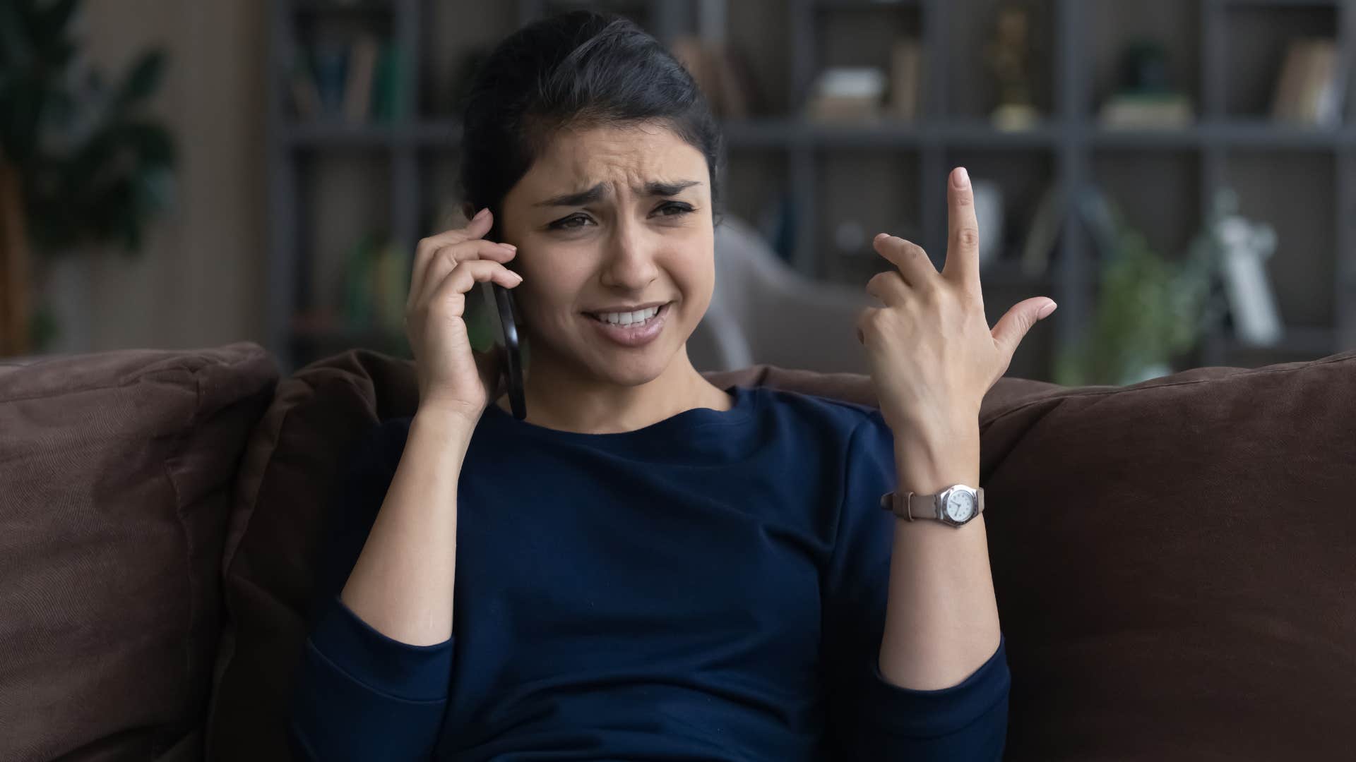 frazzled woman on the phone jumping to conclusions