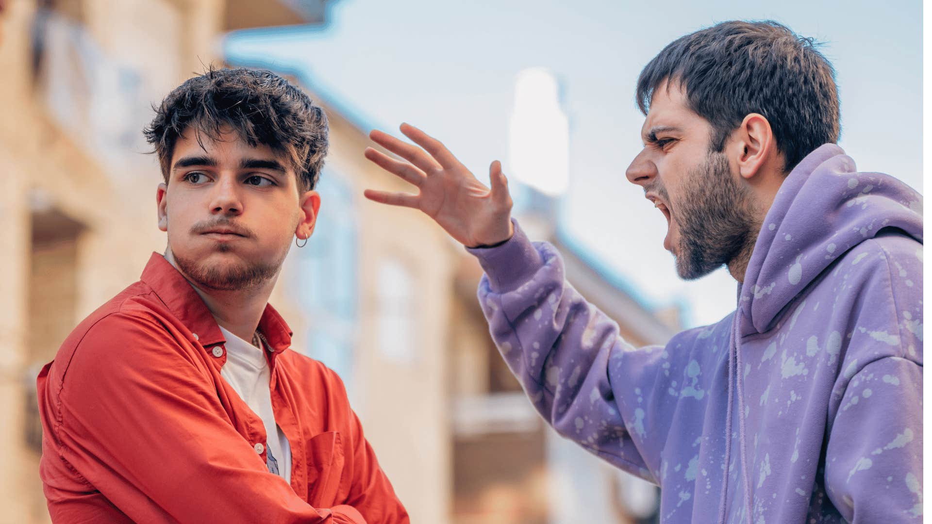 angry perfectionist man putting unrealistic expectations on friend in heated exchange