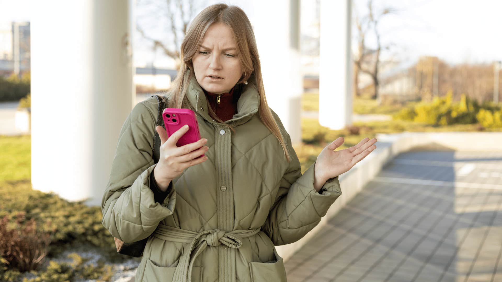 woman getting an awkward text that her friend doesn't have time for this right now