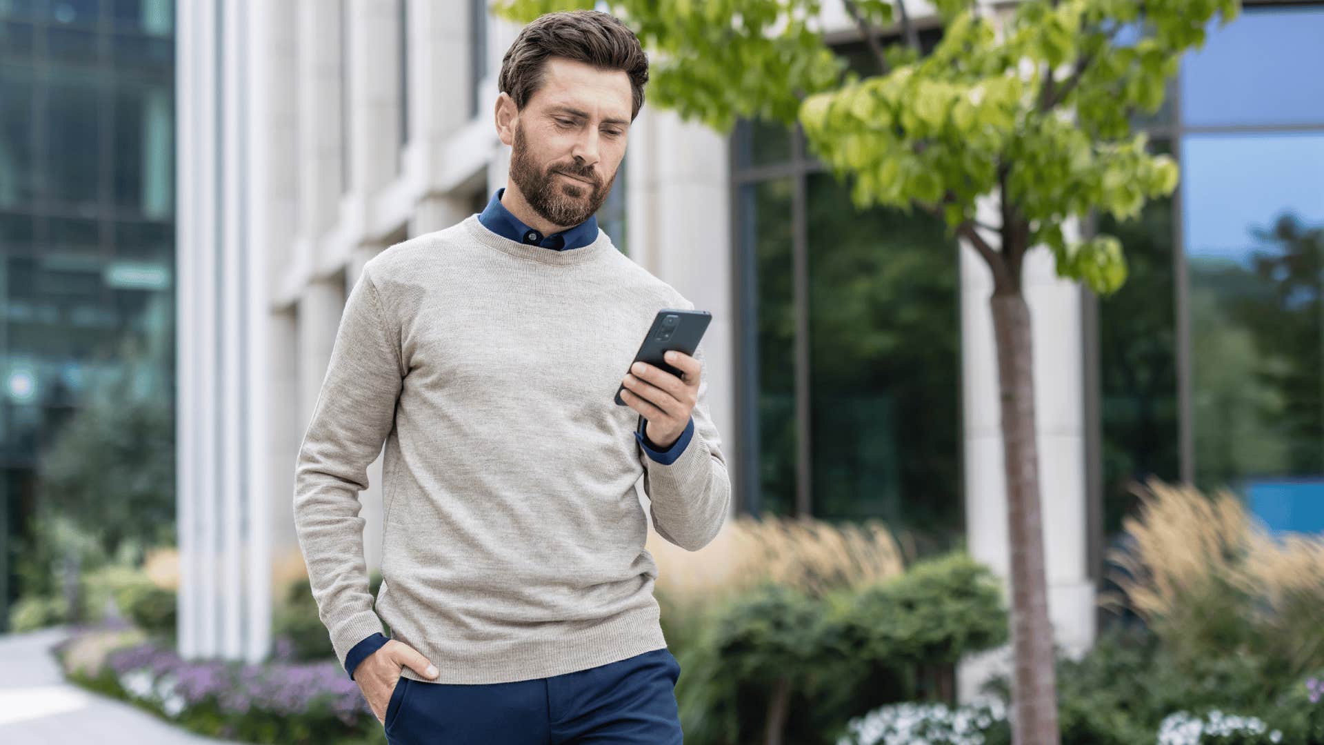 man receiving an awkward text from a longtime who says they forgot