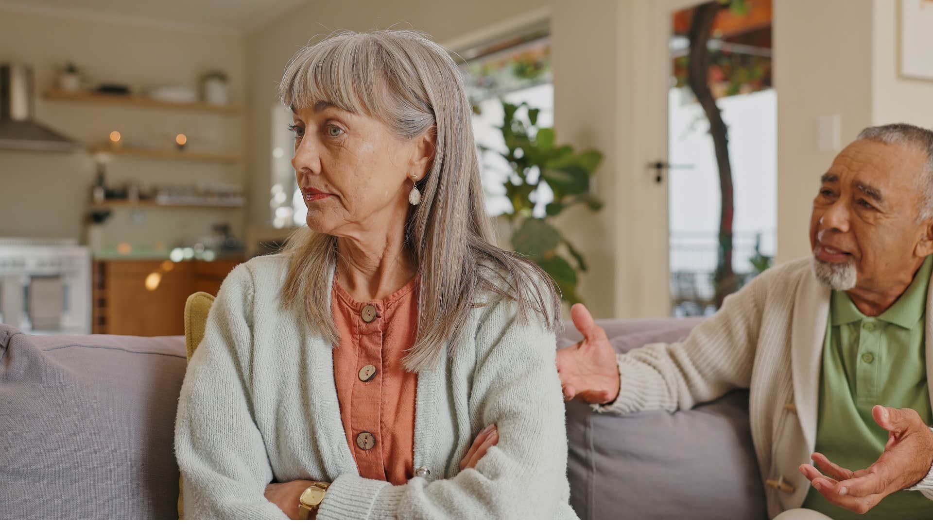 woman responding with silence to husband who keeps talking to her