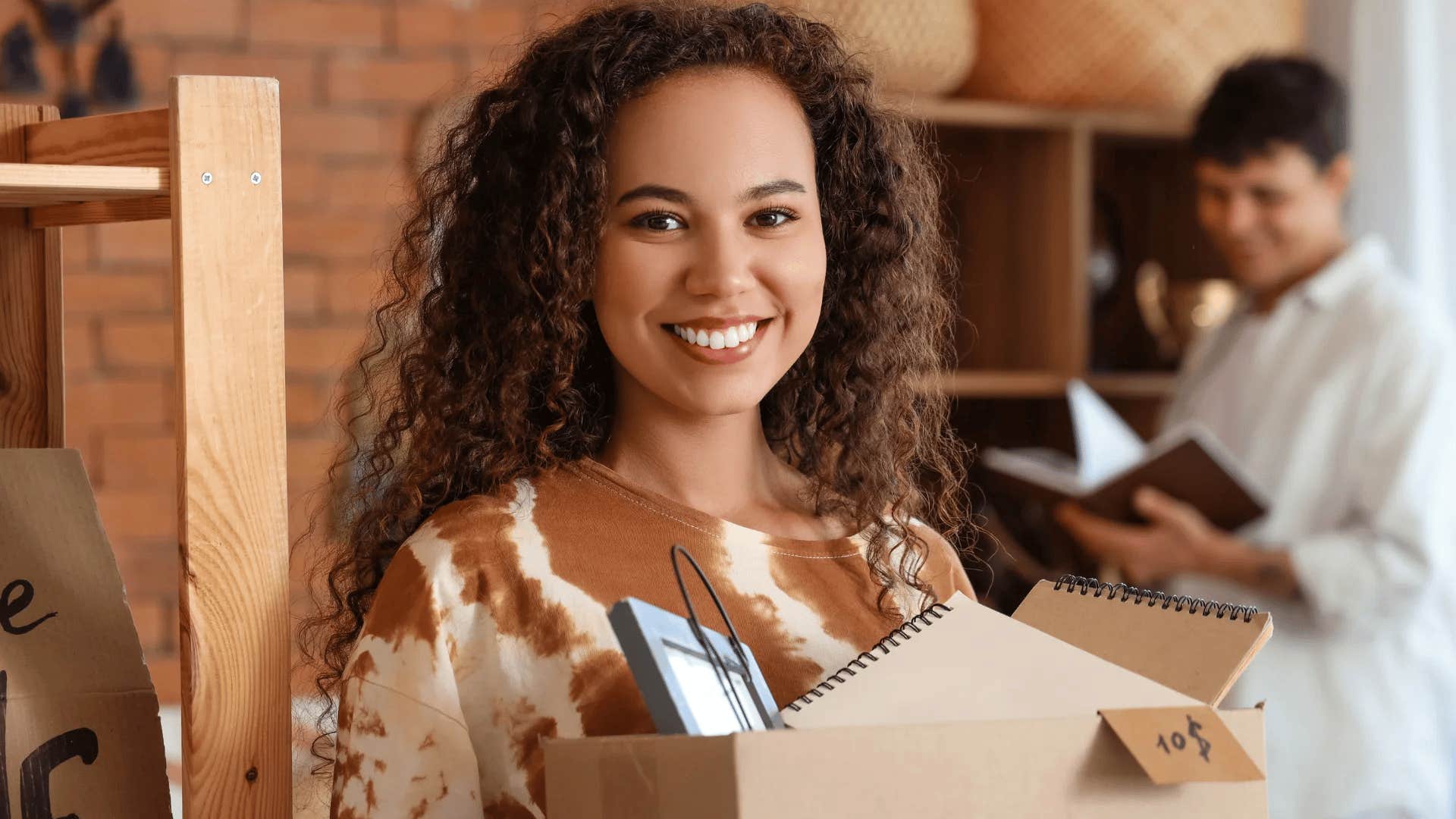 woman attending estate sale to save money