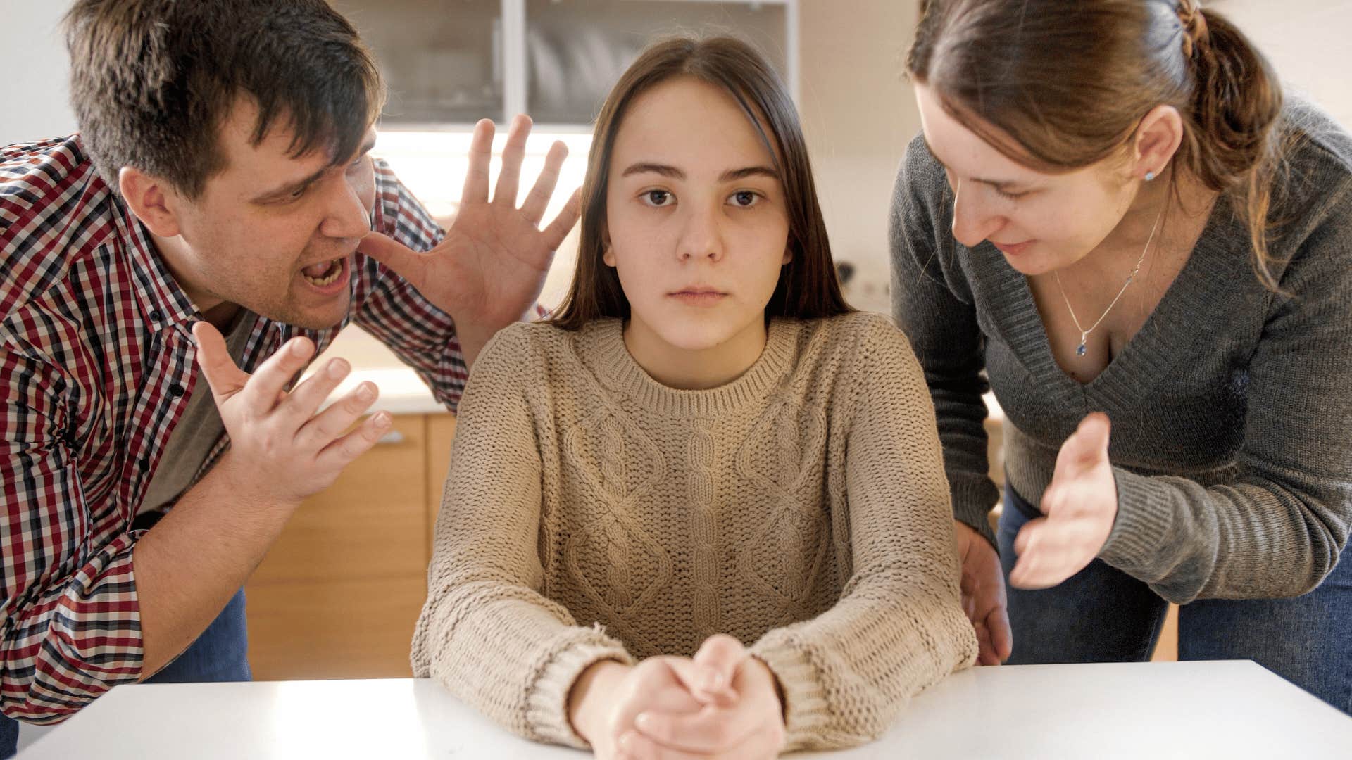 parents gaslighting and yelling at daughter they use as a scapegoat