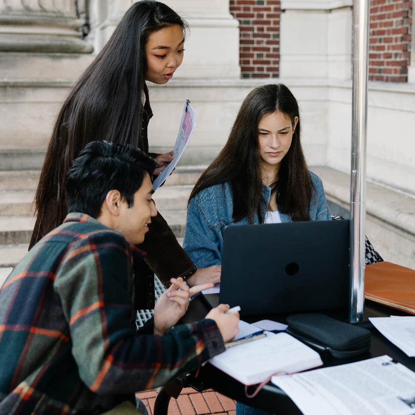 college students working together on a group project
