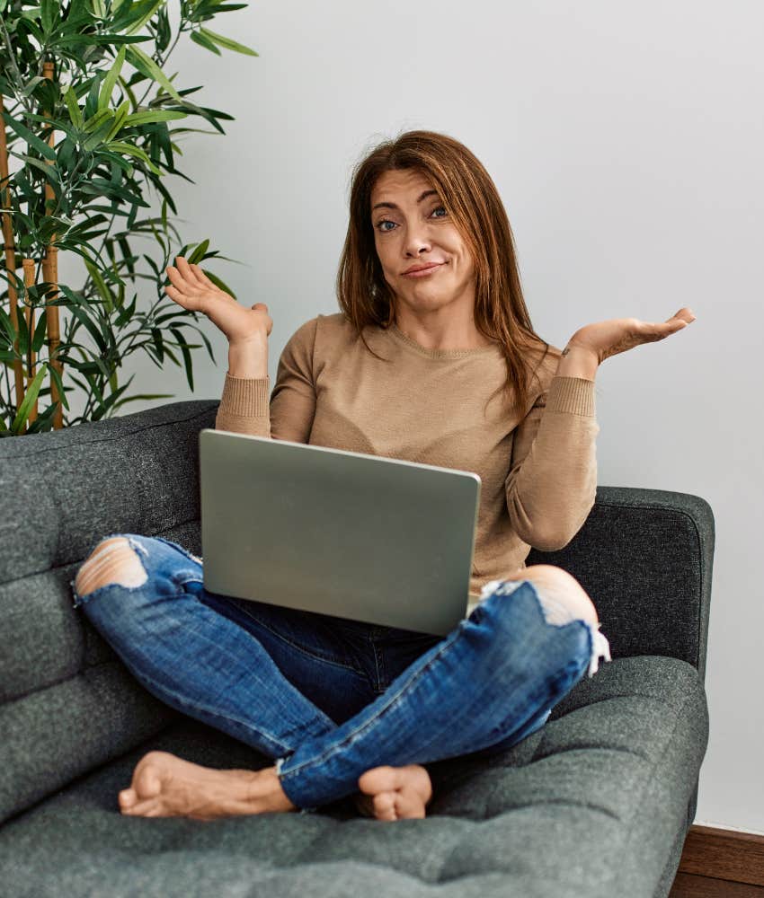 uncertain person throws up hands in denial as coping mechanism