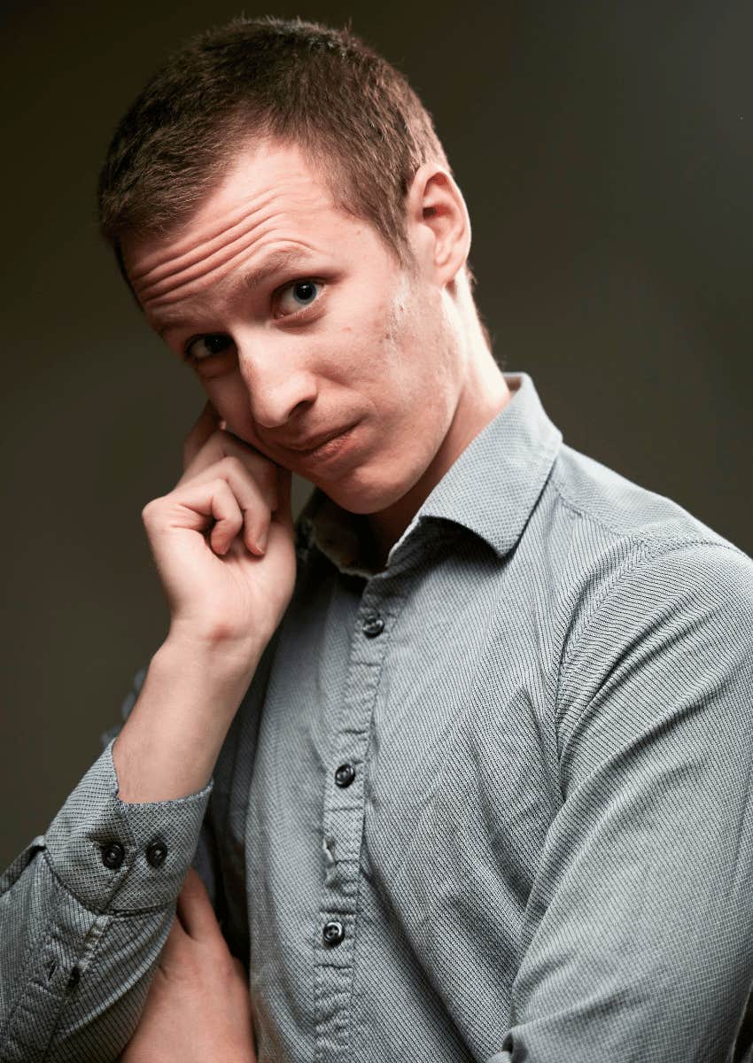 embarrassed expression on a shy man