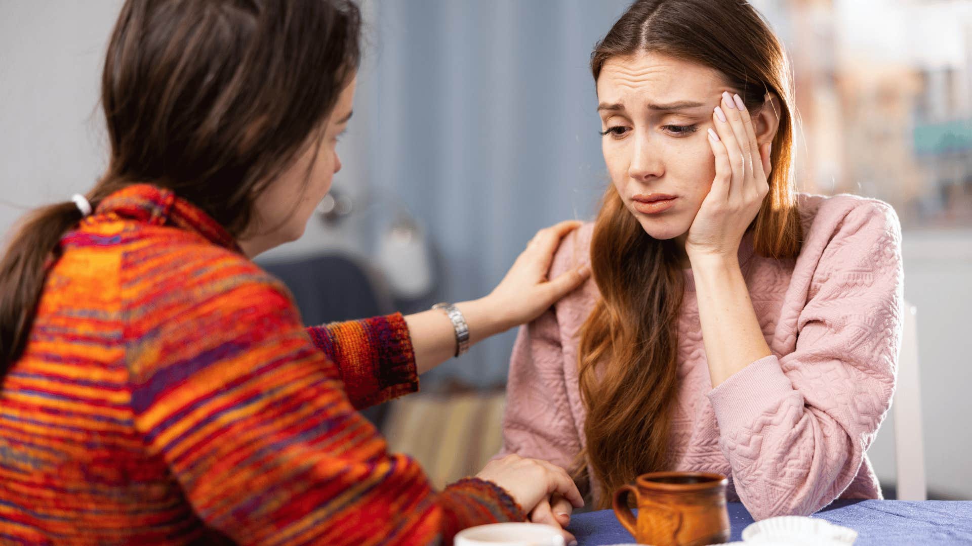 woman comforting emotionally draining friend saying i'm just never good enough