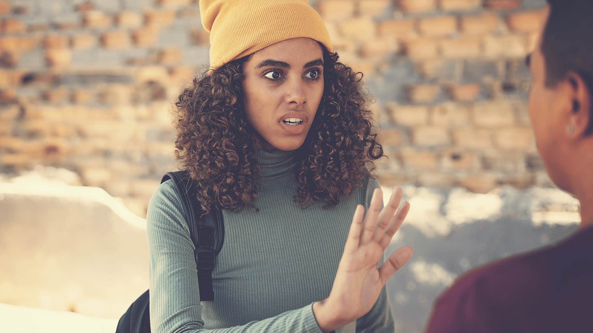 emotionally draining woman getting defensive saying it's not my fault to friend