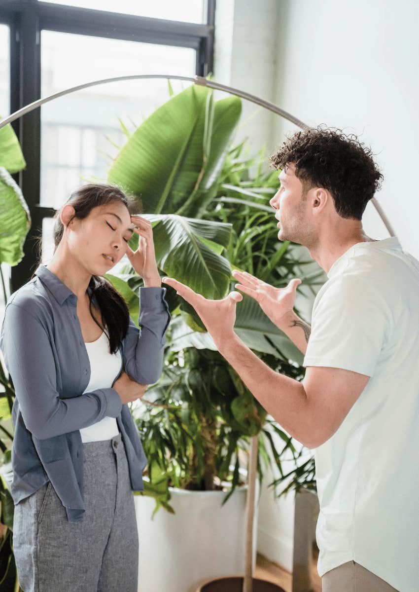 exasperated man arguing with woman