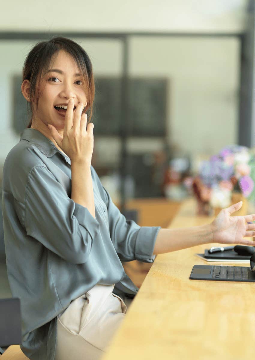 excited young woman trusting her gut feeling right