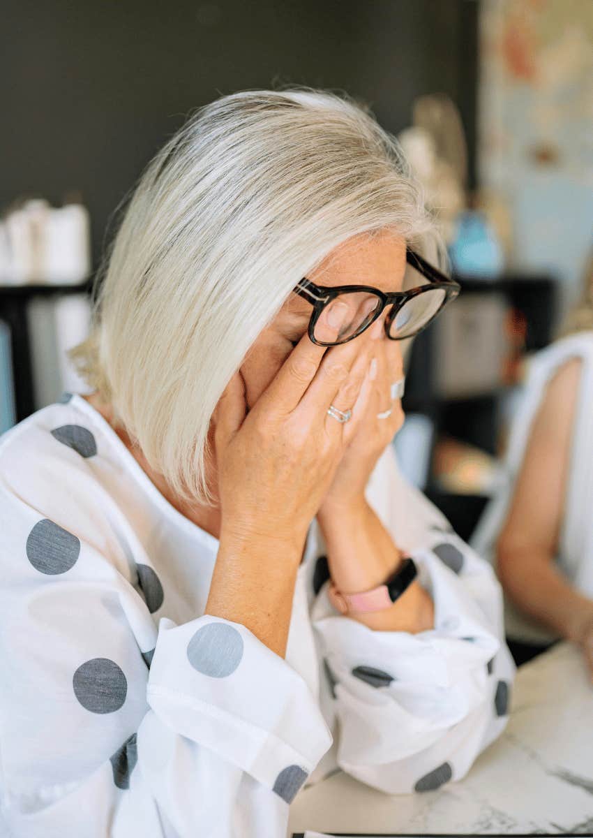 exhausted middle aged woman