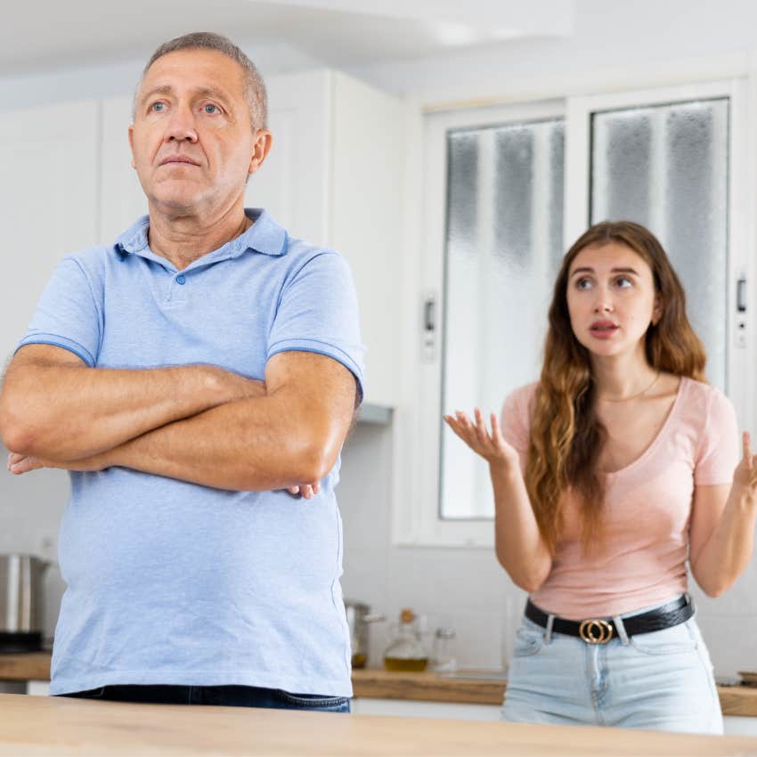 Adult daughter looking emotionally exhausted while her dad says I guess I'm just a terrible parent