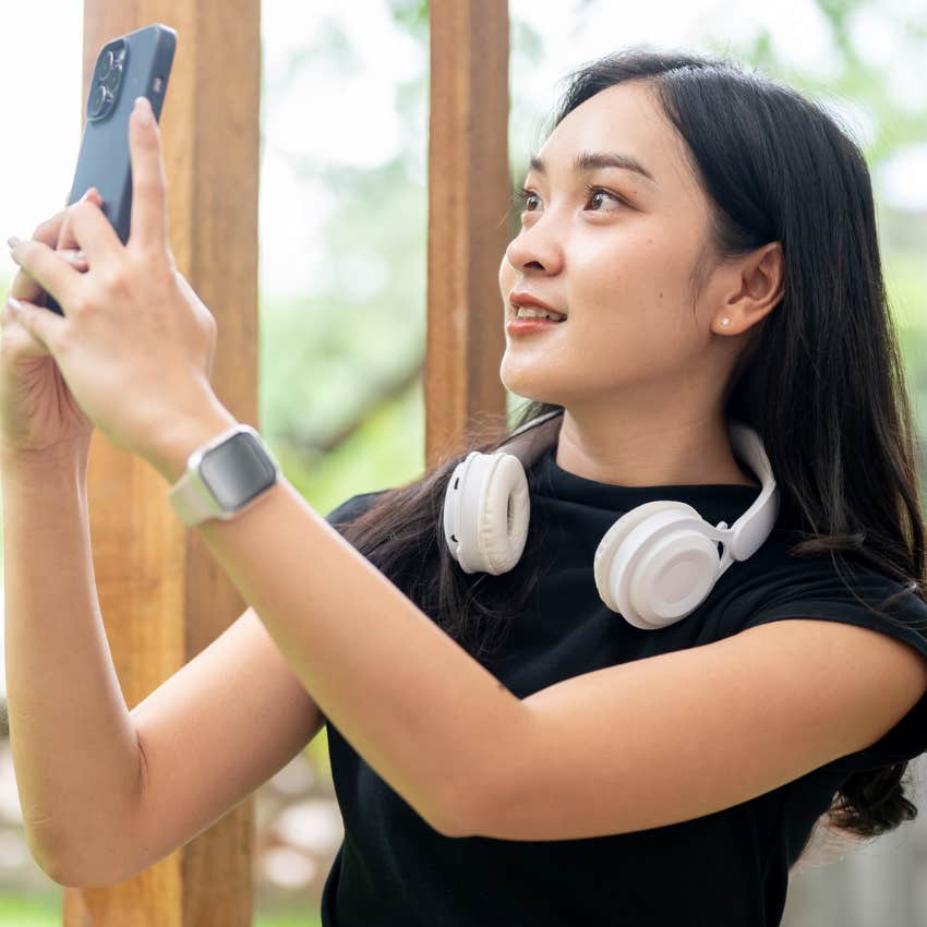 Gen Z woman recording everything on her phone