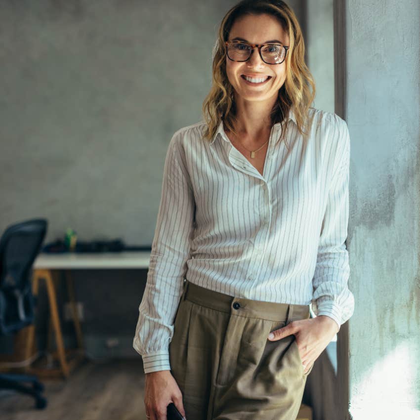 gen x woman dressed for work in blouse and slacks work appropriate