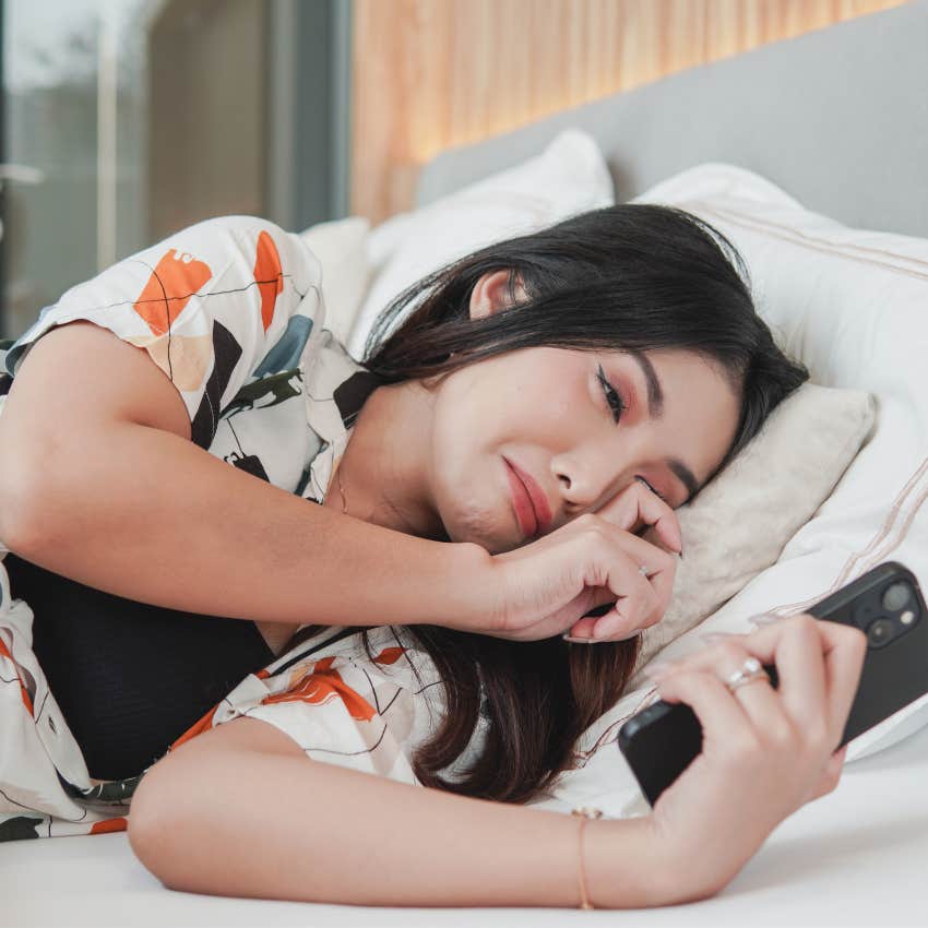 woman posting her emotional reaction in real time on social media