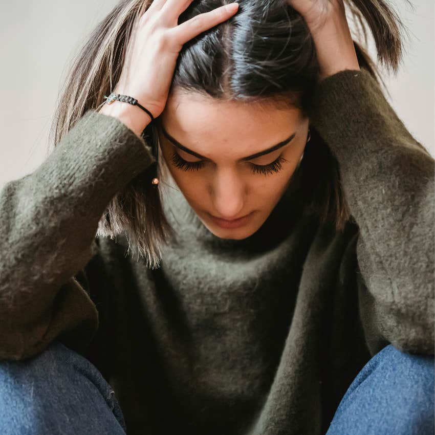 woman with negative scarcity mindset