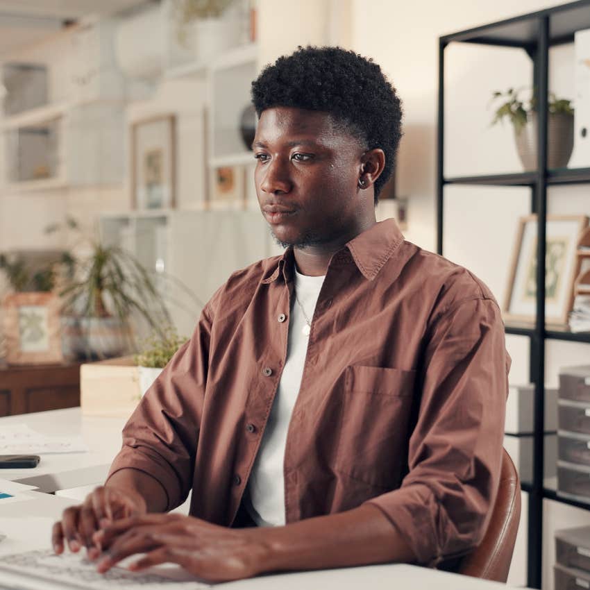 intelligent man typing on keyboard avoiding groups of three in lists