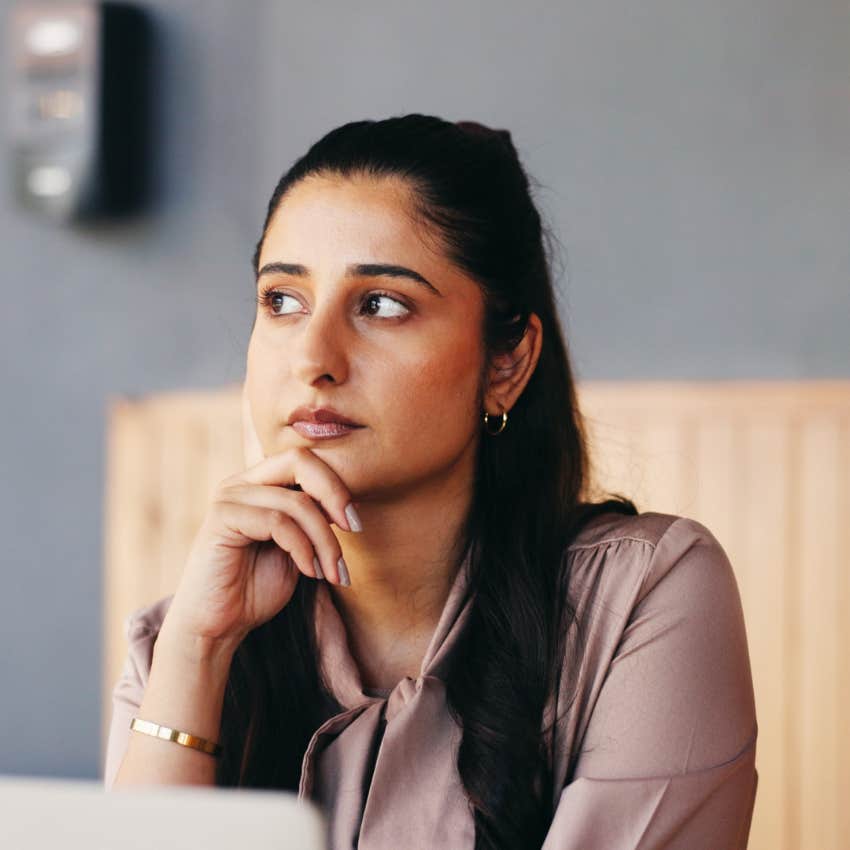 woman thinking deeply unable to make a simple decision