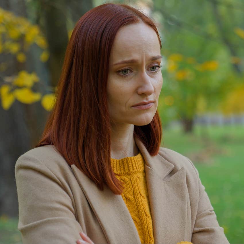woman overthinking everything standing outside feeling lost
