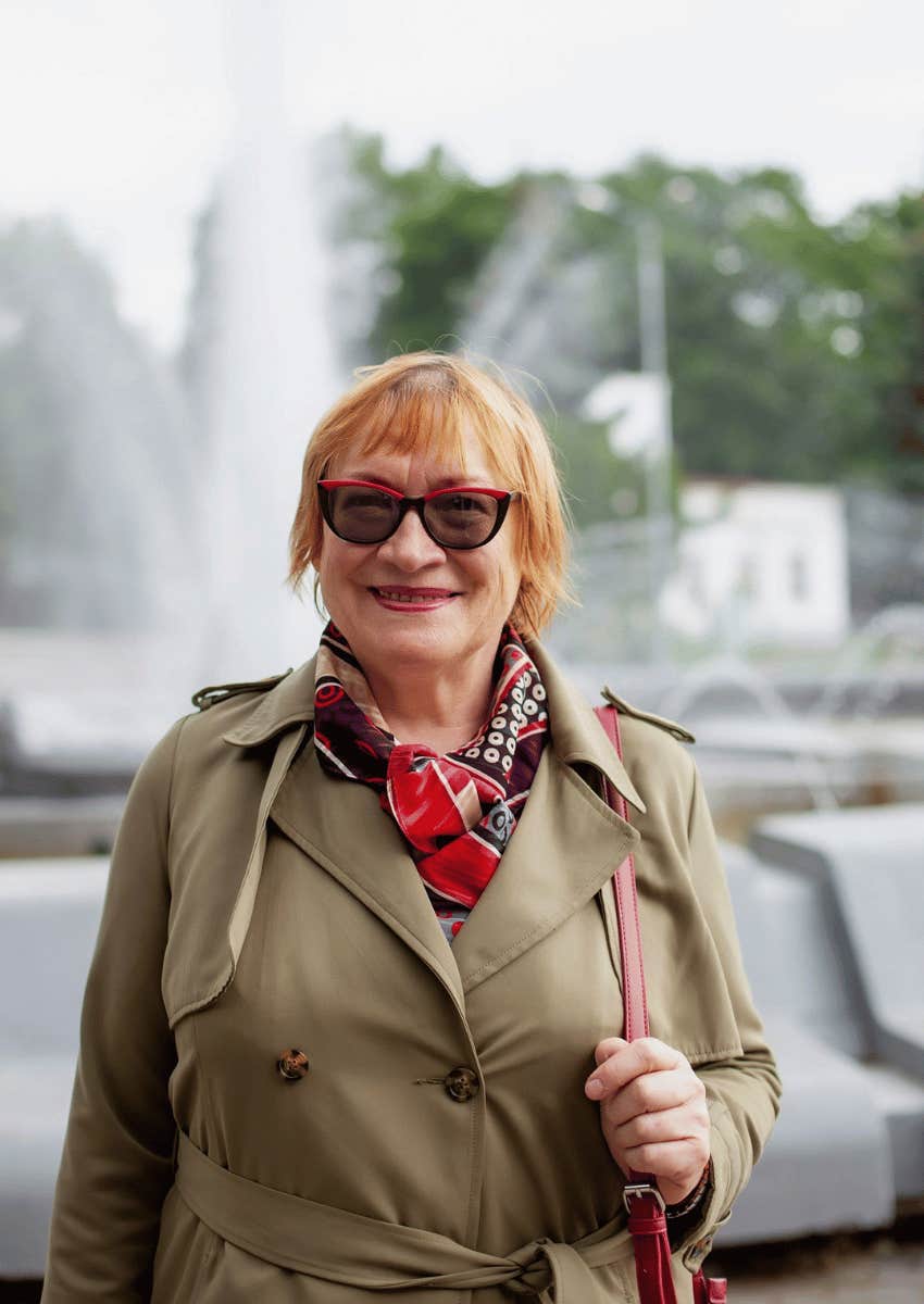 happy mature woman traveling alone