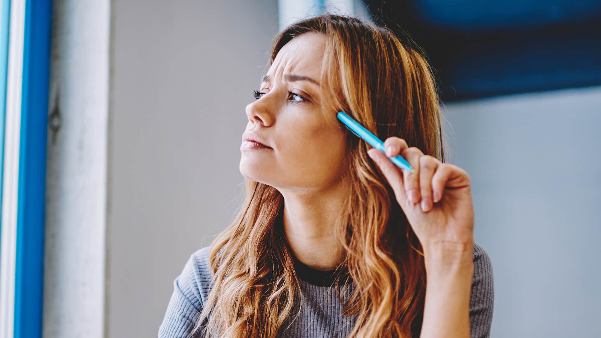 woman working hard not needing to prove her loyalty