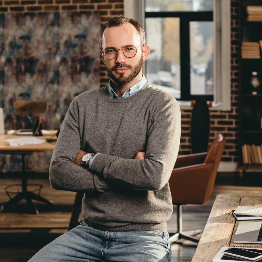 man at work feeling confident after setting boundaries