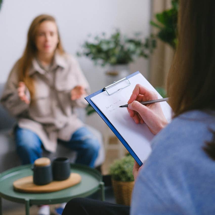 woman participating in therapy session to improve her mental health