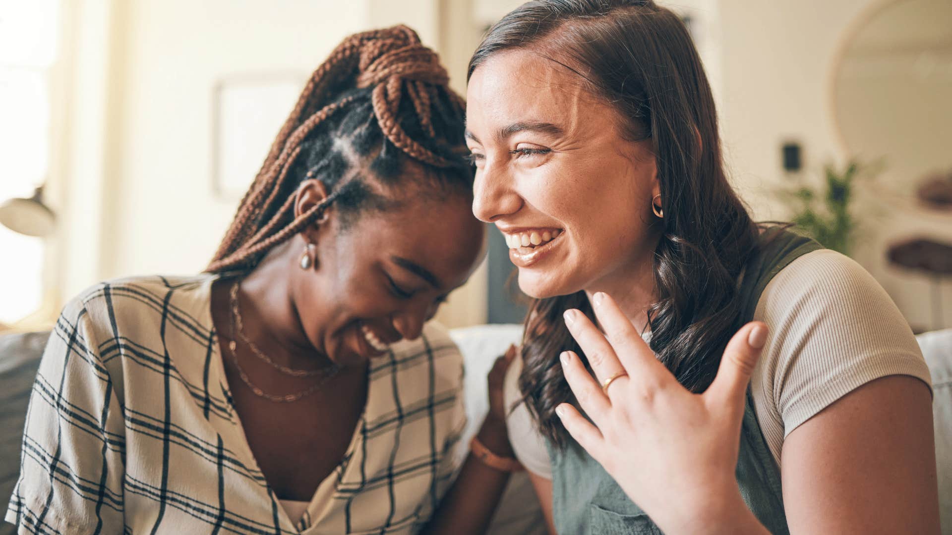 two normal women gossiping with each other