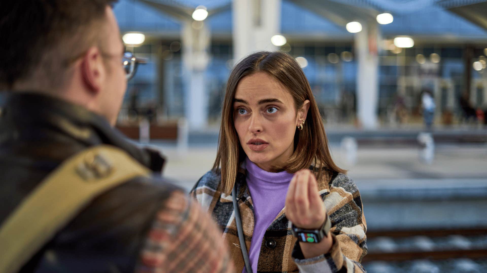 woman trying to prove she's right to partner in heated discussion
