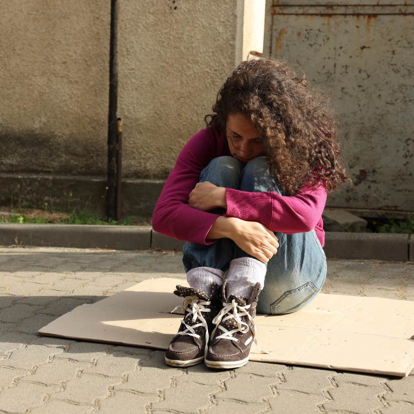 homeless woman who doesn't have a tiny sidewalk house