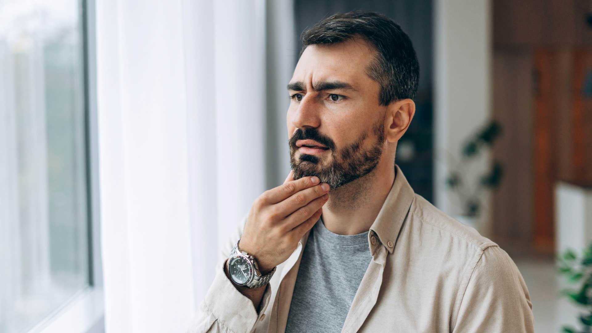 high iq man questioning things thinking deeply