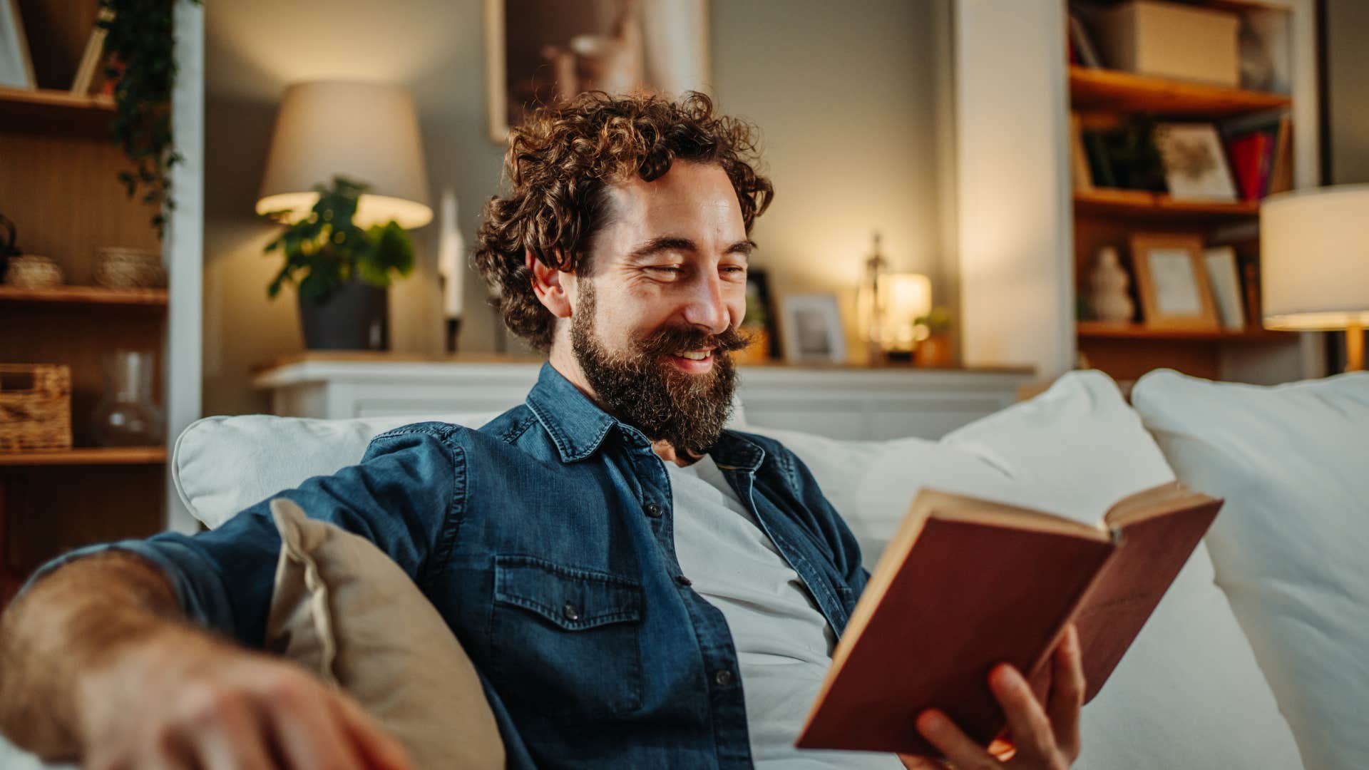 high iq man reading a book alone after socializing