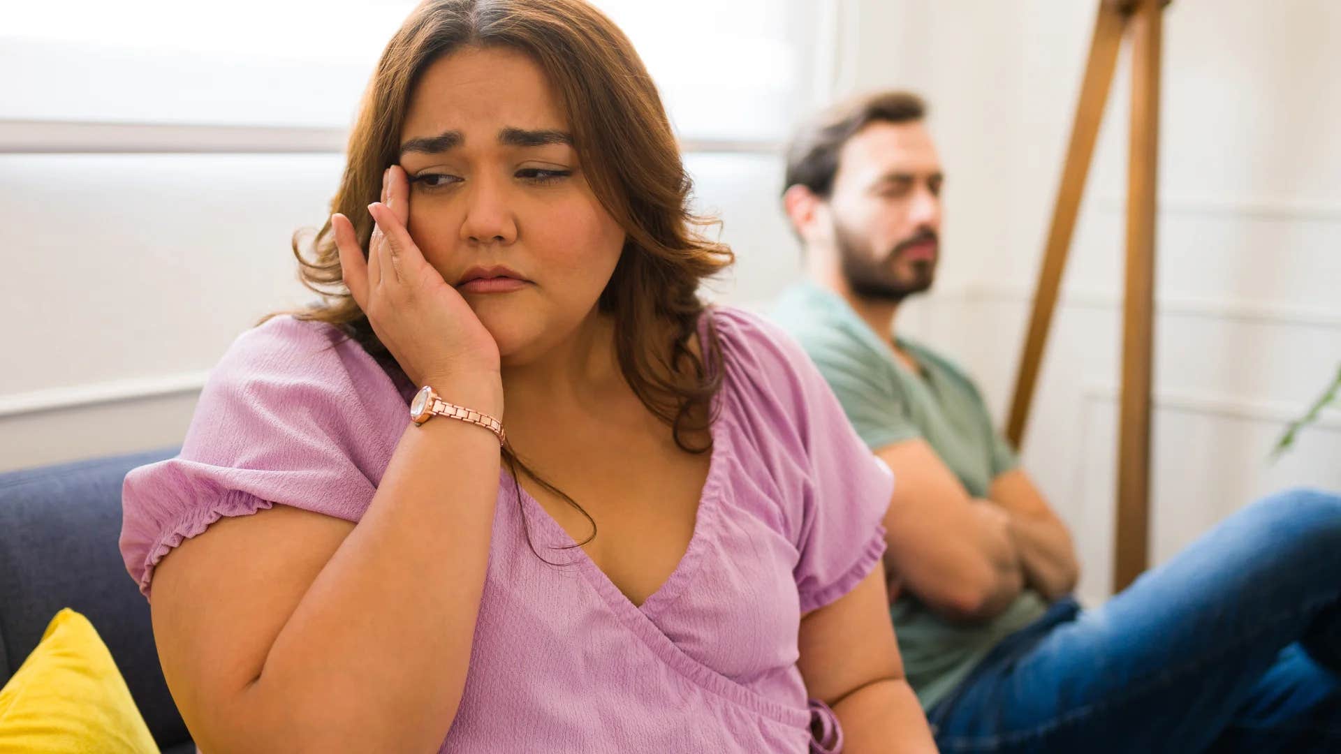 woman annoyed about having to remind distant husband about important dates