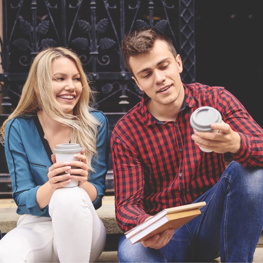 Young adult couple in a new relationship taking it easy on a front stoop
