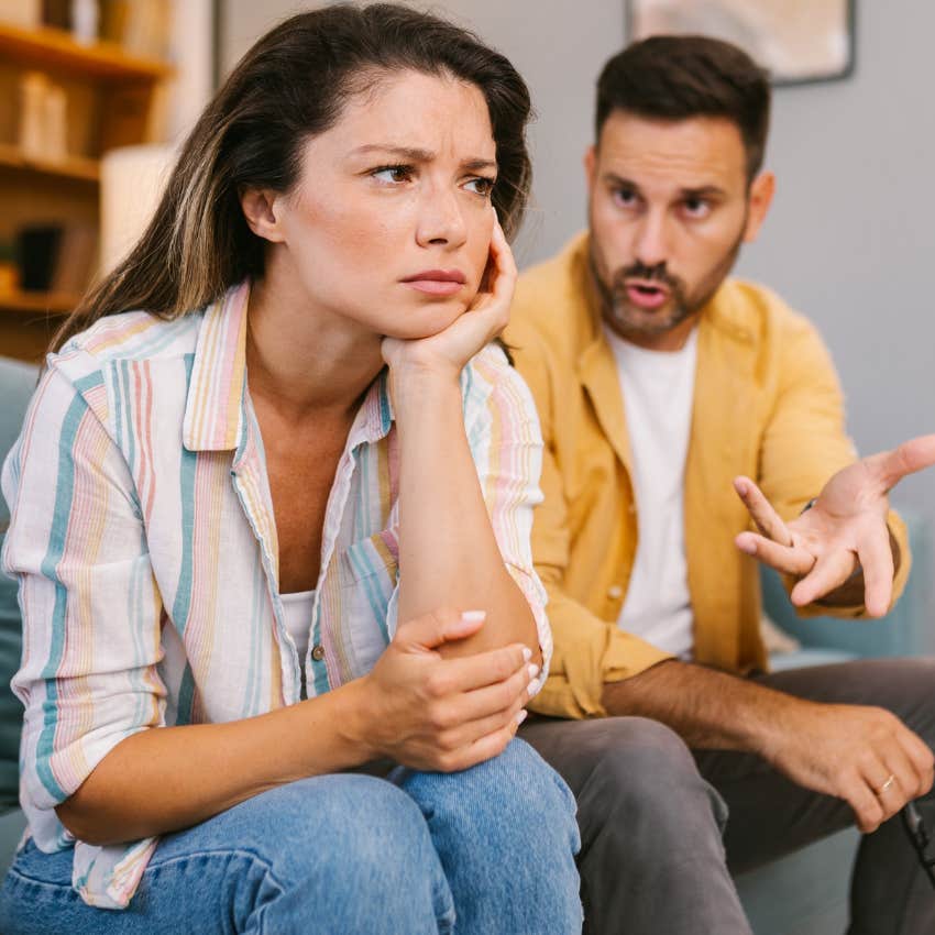 woman with zero emotional depth turned away from partner telling him i'm just ambitious