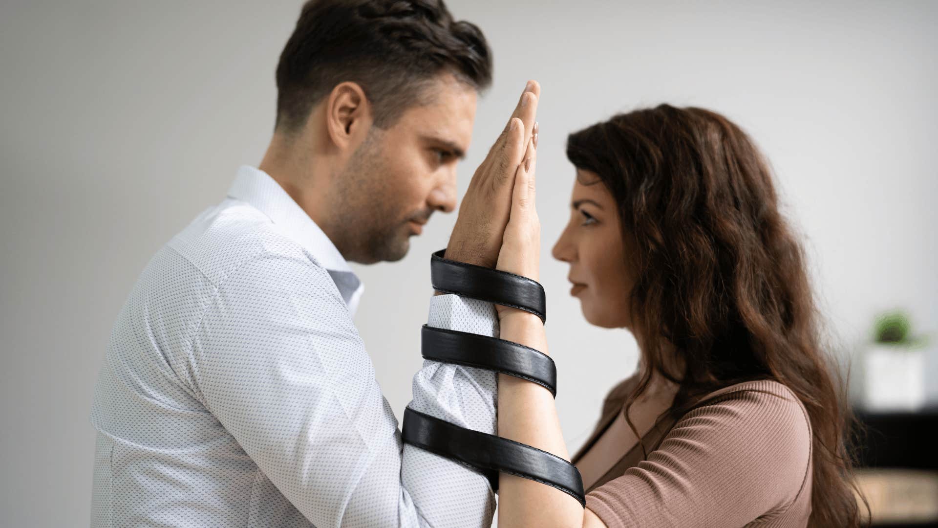 couple locked locked together in codependency 