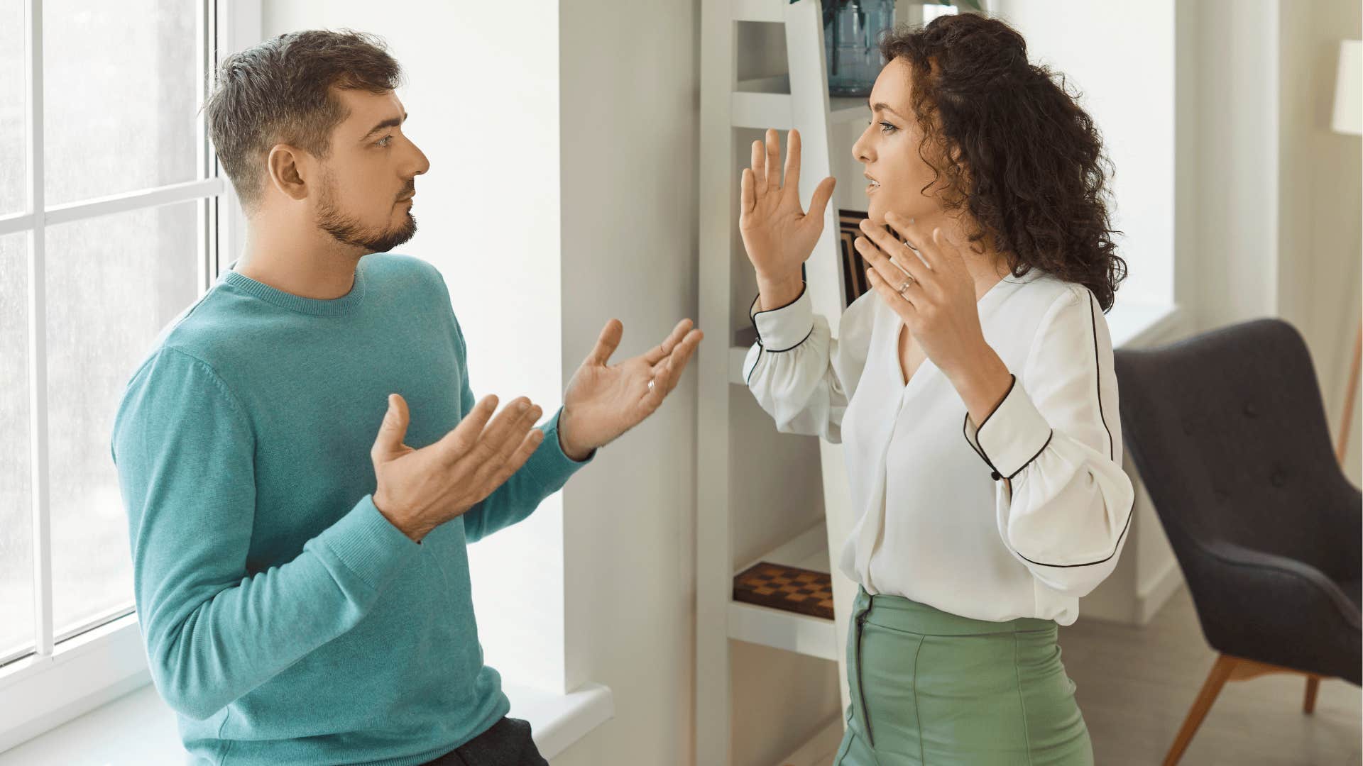 couple engaging in conflict at home