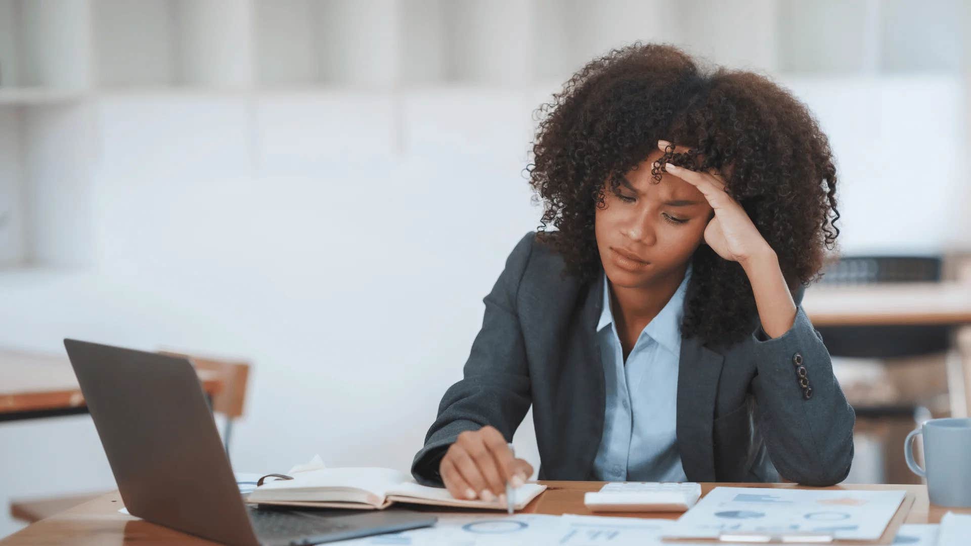pensive woman saying to herself i'm too young to worry about retirement