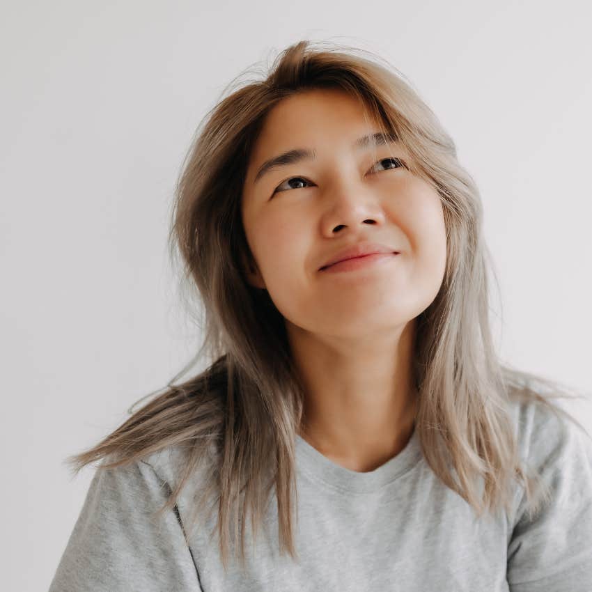 woman smiling after just waking up
