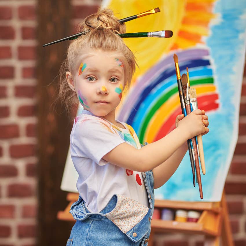 little girl painting who craves more hands-on creativity