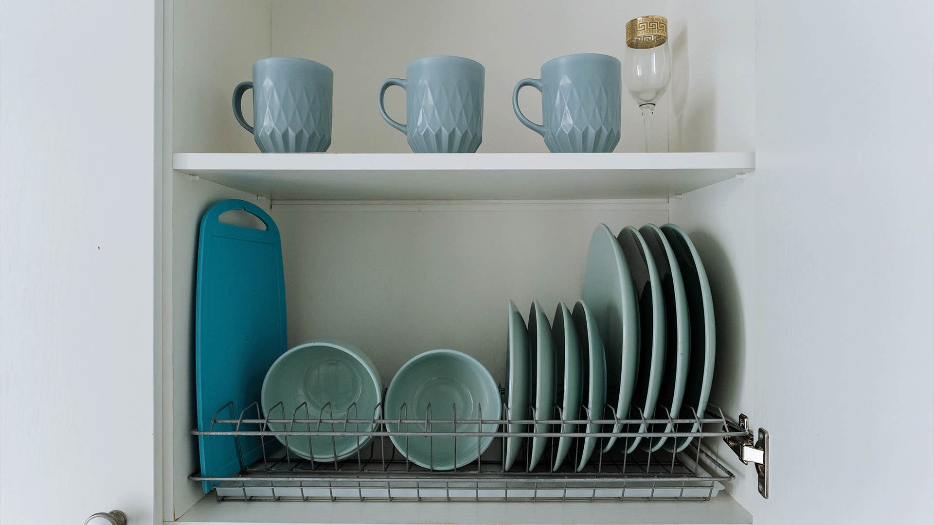 kitchen stocked with a full set of dishes
