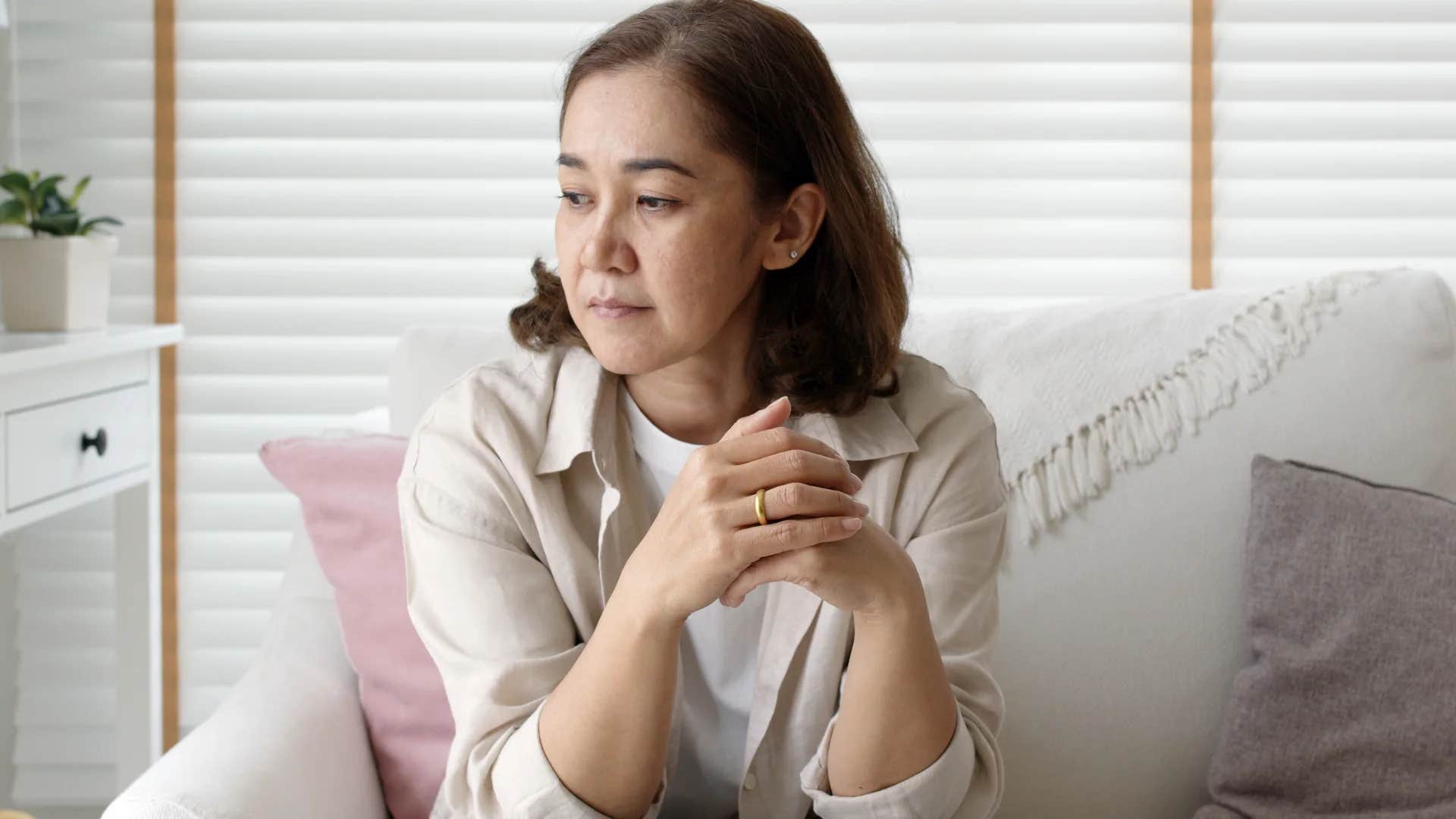 older woman avoiding any conflicts with her kids