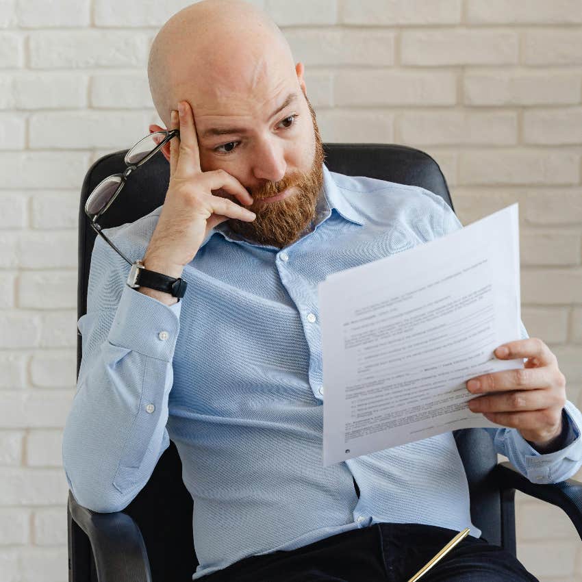 recruiter reading a resume