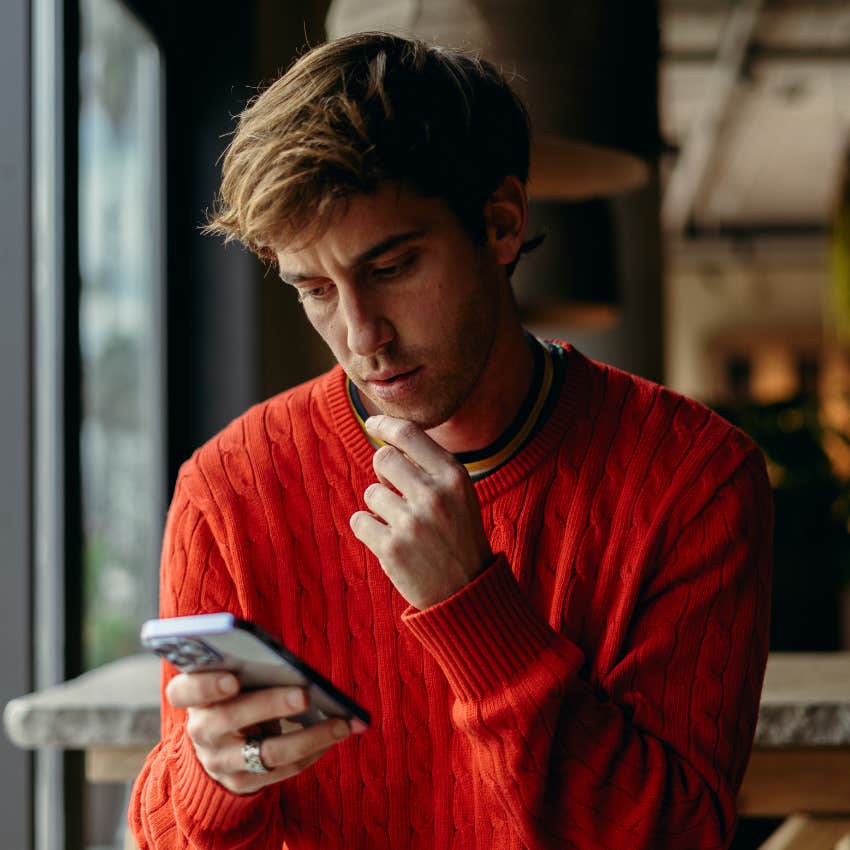 man reading text exchange with high school bully