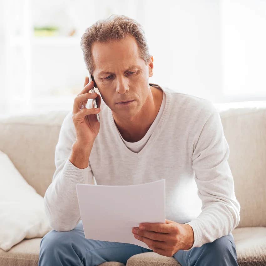 man on the phone with a representative about a bill